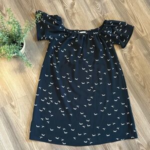 NAVY TUNIC BLOUSE WITH RUFFLE SLEEVES AND WHITE BIRDS OFF SHOULDER SIZE SMALL